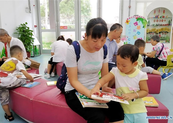 Guangzhou Children's Library Welcomes Rush Season During Su